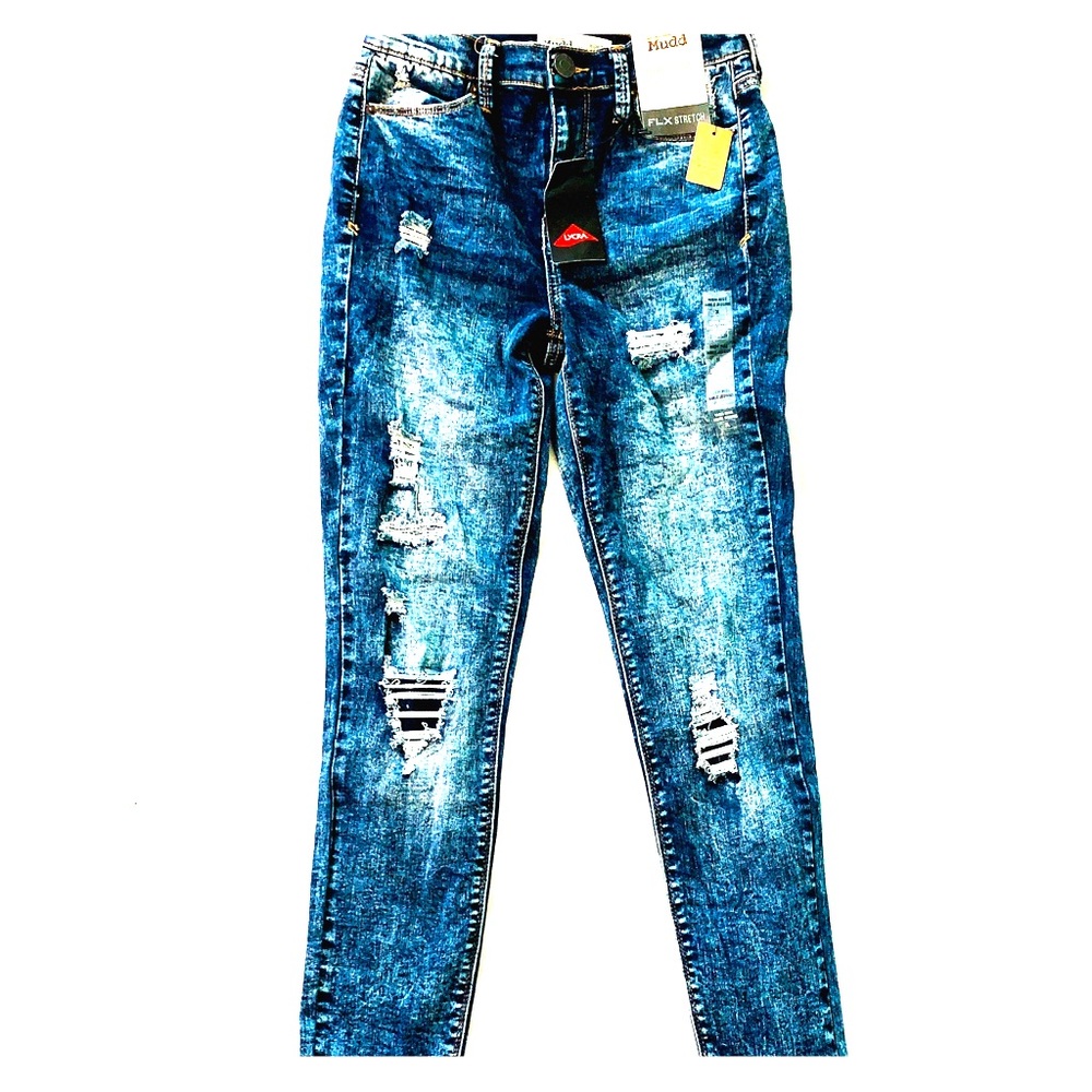 Ripped acid washed jeans.